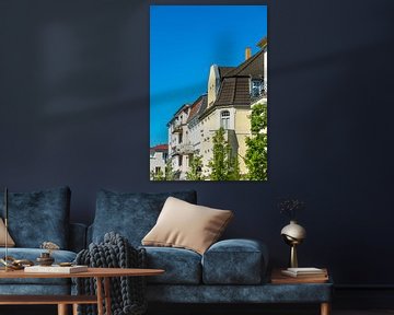 Buildings with trees in Warnemuende, Germany by Rico Ködder