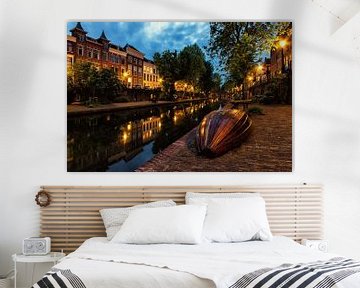 Boat at the yard of the Oudegracht in Utrecht in the evening (colour) by André Blom Fotografie Utrecht