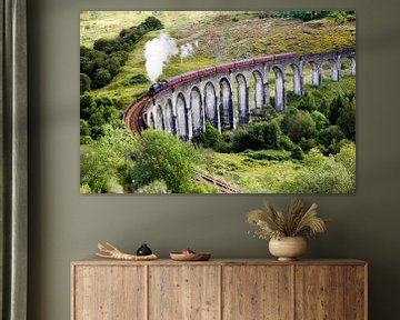 Jacobite steam train on old Glenfinnan viaduct in Scotland by Thomas Boudewijn