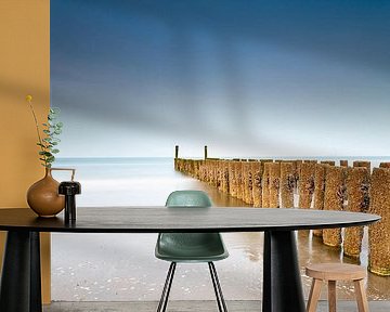 Wooden poles Zoutelande Zeeland by Menno Schaefer