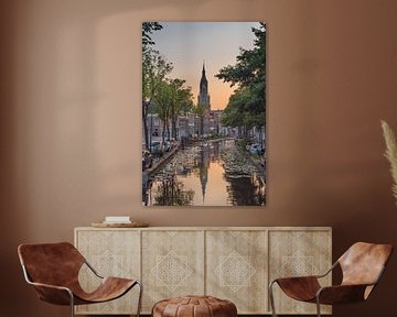 Delft - Nieuwe kerk zonsondergang van Erik van 't Hof