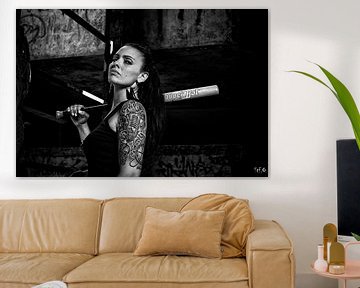 Tattooed woman with baseball bat by Atelier Liesjes