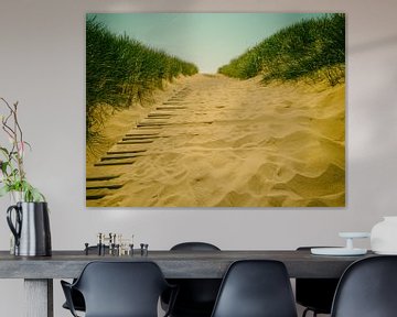 A wooden road leads over the dunes to the beach at Nieuwvliet-Bad. In the distance you can already s by Lex Schulte