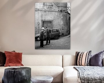 Typical italian street scene with old men in monochrome by iPics Photography