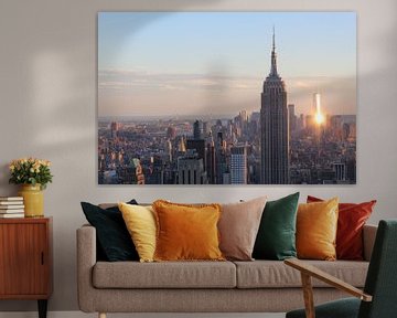 Uitzicht op New York tijdens zonsondergang inclusief One World Trade Center en Empire State Building van Phillipson Photography