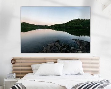 Reflection of trees in a lake in Norway