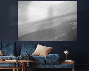 Foggy mountain layers in Bernese Oberland - Switzerland. Black and white fine art photograph by Hidde Hageman