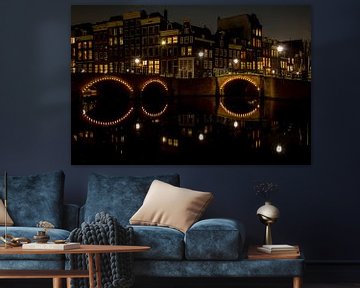 De grachten van Amsterdam in de nacht van Hans de Waay