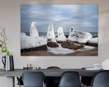 Groynes on shore of the Baltic Sea in winter time