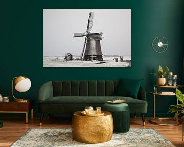 Windmill in a winter landscape by eric van der eijk