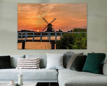 Kinderdijk oranje zonsopgang van Gea Gaetani d'Aragona