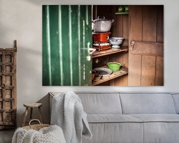 Authentic petroleum pots in an old-fashioned Dutch kitchen cabinet by Fotografiecor .nl