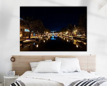 Dutch canals at night under a starry sky by Fotografiecor .nl