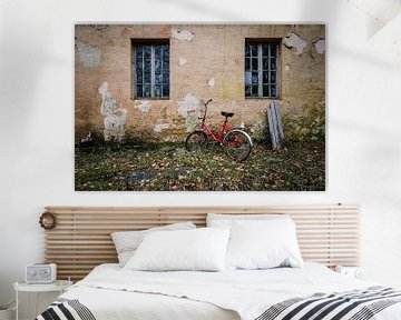 Red bicycle at abandoned house by Inge van den Brande
