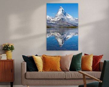 Reflection of the Matterhorn in mountain lake by Menno Boermans