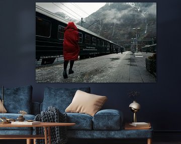 Woman in red coat at Flam station, Norway
