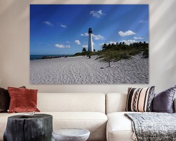 Peaceful island beach with white sand and lighthouse in Florida