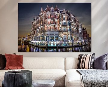 Zonsondergang Amsterdam Hotel De L'Europe van Jacco van der Zwan