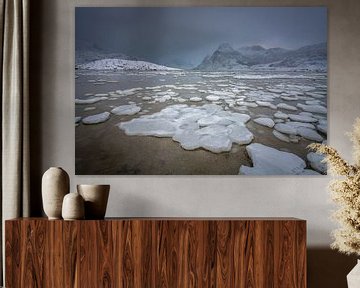 Winter landscape on the Lofoten with frozen fjord and snow mountains by Chris Stenger
