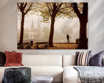 Oostpoort in de herfst mist van Gerhard Nel