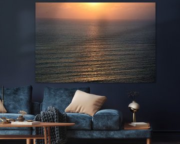 weerspiegeling van de zonsondergang op zee van Gerrit Neuteboom