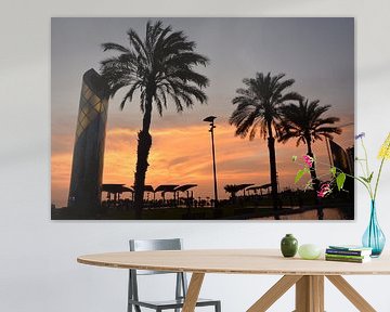 tropishe palmbomen onder de zonsondergang van Gerrit Neuteboom