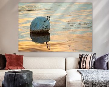 Buoy beacon in the water by Margreet Frowijn