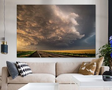 Stormclouds crossing the road by Menno van der Haven
