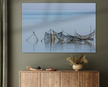 oude visnetten in de Waddenzee van Harry Siegers