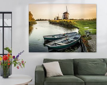 The mill of Leidschendam with a few boats in the foreground. by Claudio Duarte