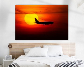 KLM Cityhopper is crossing the sun