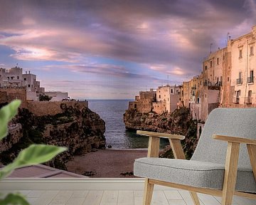 Panorama van Polignano a Mare met zonsondergang van Costas Ganasos