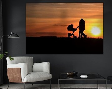 Paar mit Kinderwagen Sonnenuntergang von Bobsphotography