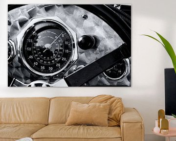 Brushed aluminium dashboard with speedometer on a vintage 1920s British race car by Sjoerd van der Wal Photography