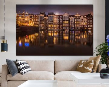 Moon rise at the Damrak in Amsterdam by Tristan Lavender