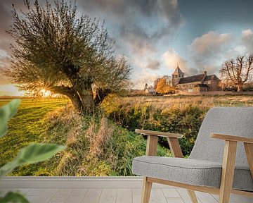 Zonsondergang bij de oude kerk in Oosterbeek van Daan van Oort