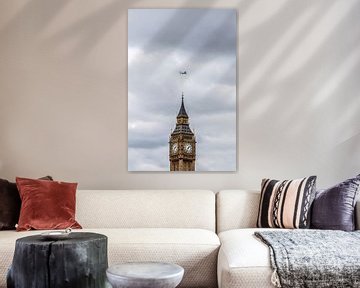 Airplane disappears in the clouds over Big Ben by Felix Brönnimann