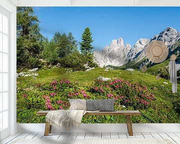 Alpine roses in the mountains by Coen Weesjes