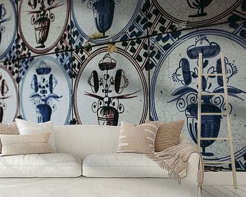 Antieke Twentse bloempot tegels achter de open haard von Ortsdrucke