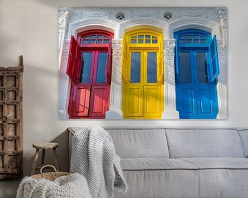 Colonial style doors in red, yellow & blue by Jan van Dasler