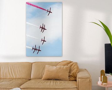 Red Arrows flying a turn in formation by Wim Stolwerk