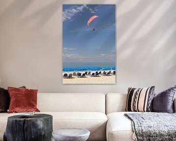 Paragliding above the beach on a beautiful summer day by Shot it fotografie
