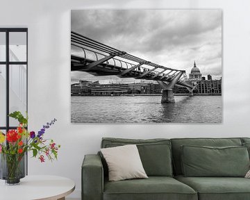 View of the Millennium Bridge over the River Thames with the dome of St. Paul's Cathedral in the bac by Carlos Charlez