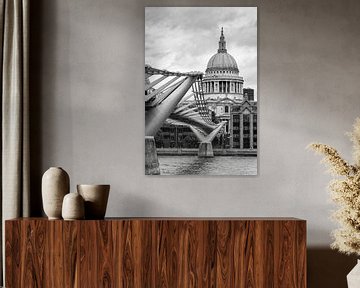 View of the Millennium Bridge over the River Thames with the dome of St. Paul's Cathedral in the bac by Carlos Charlez