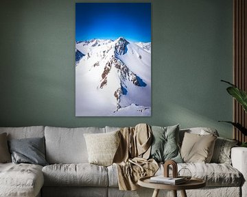 Besneeuwde Tiroler Alpen in Oostenrijk tijdens een prachtige winterdag van Sjoerd van der Wal Fotografie
