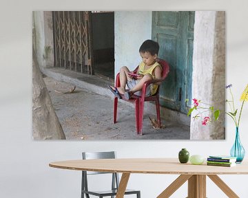 Vietnamese child playing by mathieu van wezel