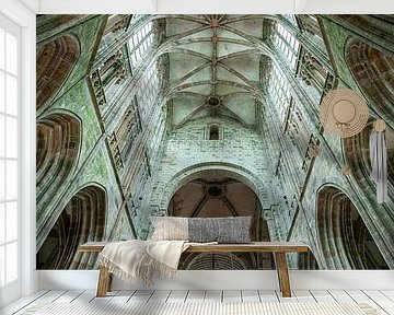 A close-up of the architecture of the cathedral in Mont Saint Michel in France by Wout Kok