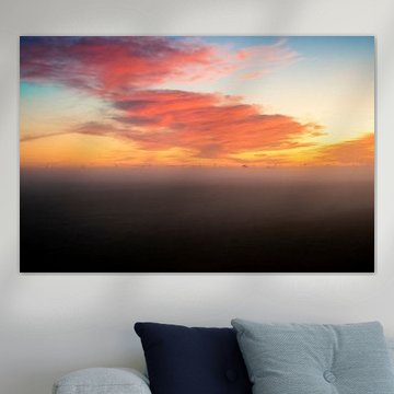 Sonnenaufgang über einem nebligen Eempolder