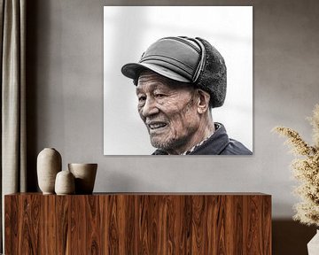 Chinese man with hat by Rob Bleijenberg