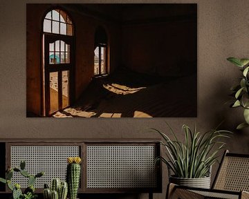 The windows of a ruin in ghost town Kolmanskop by Maartje Kikkert